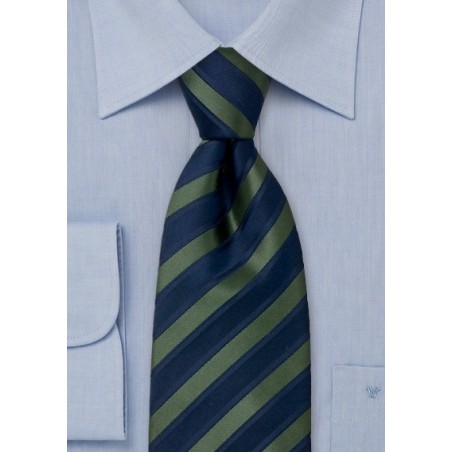 Striped navy blue and forest green silk tie  -  Navy blue and dark green striping pattern