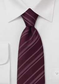 Striped burgundy color silk tie  -  Burgundy red necktie with fine stripes