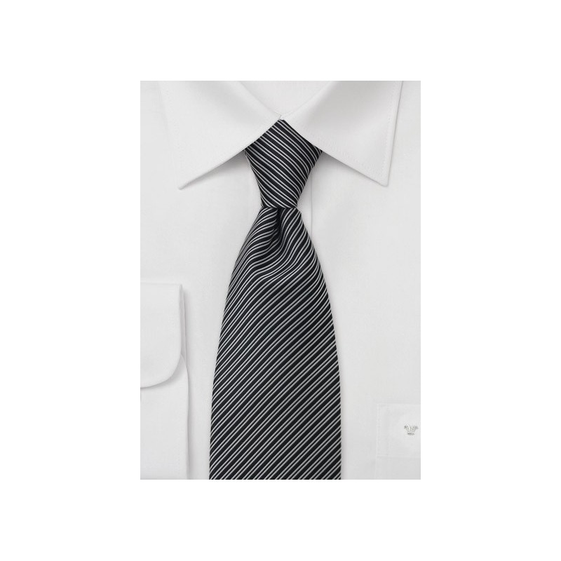 Striped black and white necktie