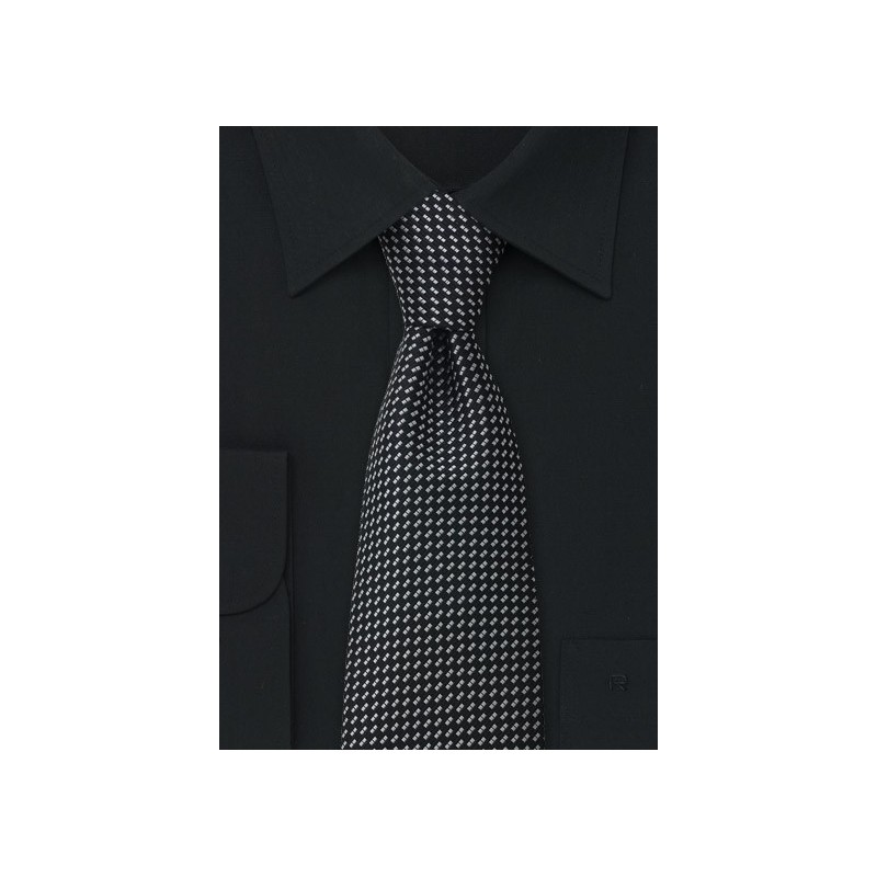 Black patterned tie  -  Black necktie with silver pattern