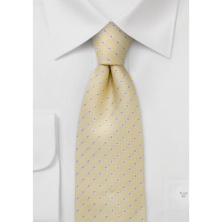 Yellow silk tie with tiny flower pattern