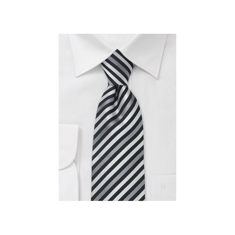 Thin striped silk tie in black, silver, and gray