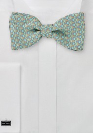 Turquoise Bowtie with Orange and Blue Pattern