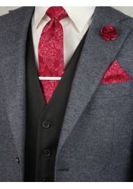 Matching raspberry red paisley necktie and pocket square